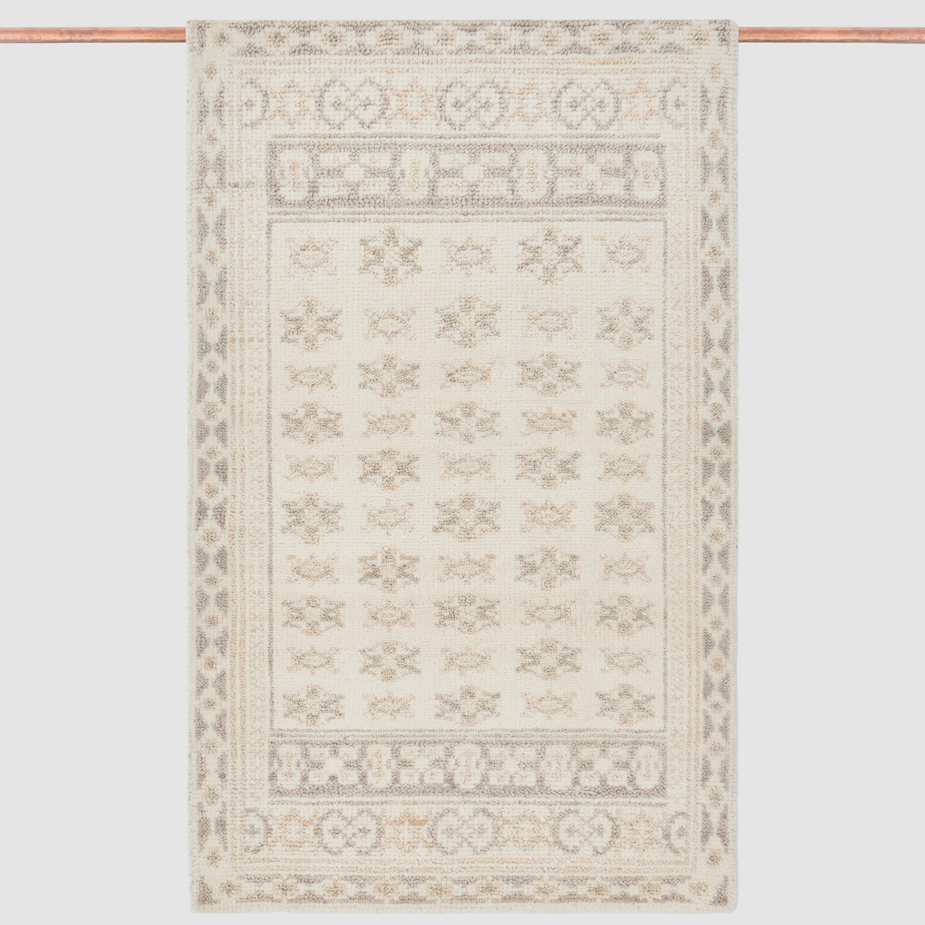 Handwoven Rug with Subtle Raised Pattern | Light Neutral Tone