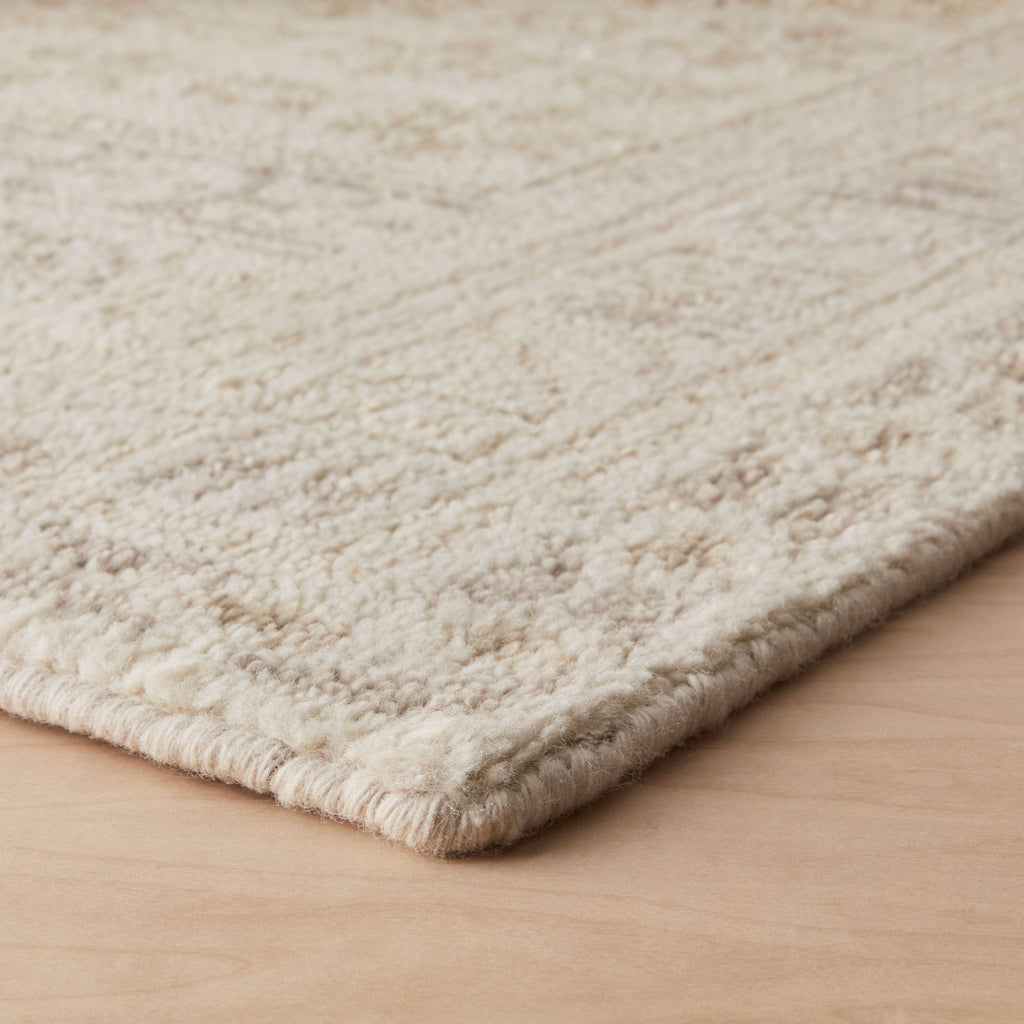Handwoven Rug with Subtle Raised Pattern | Light Neutral Tone