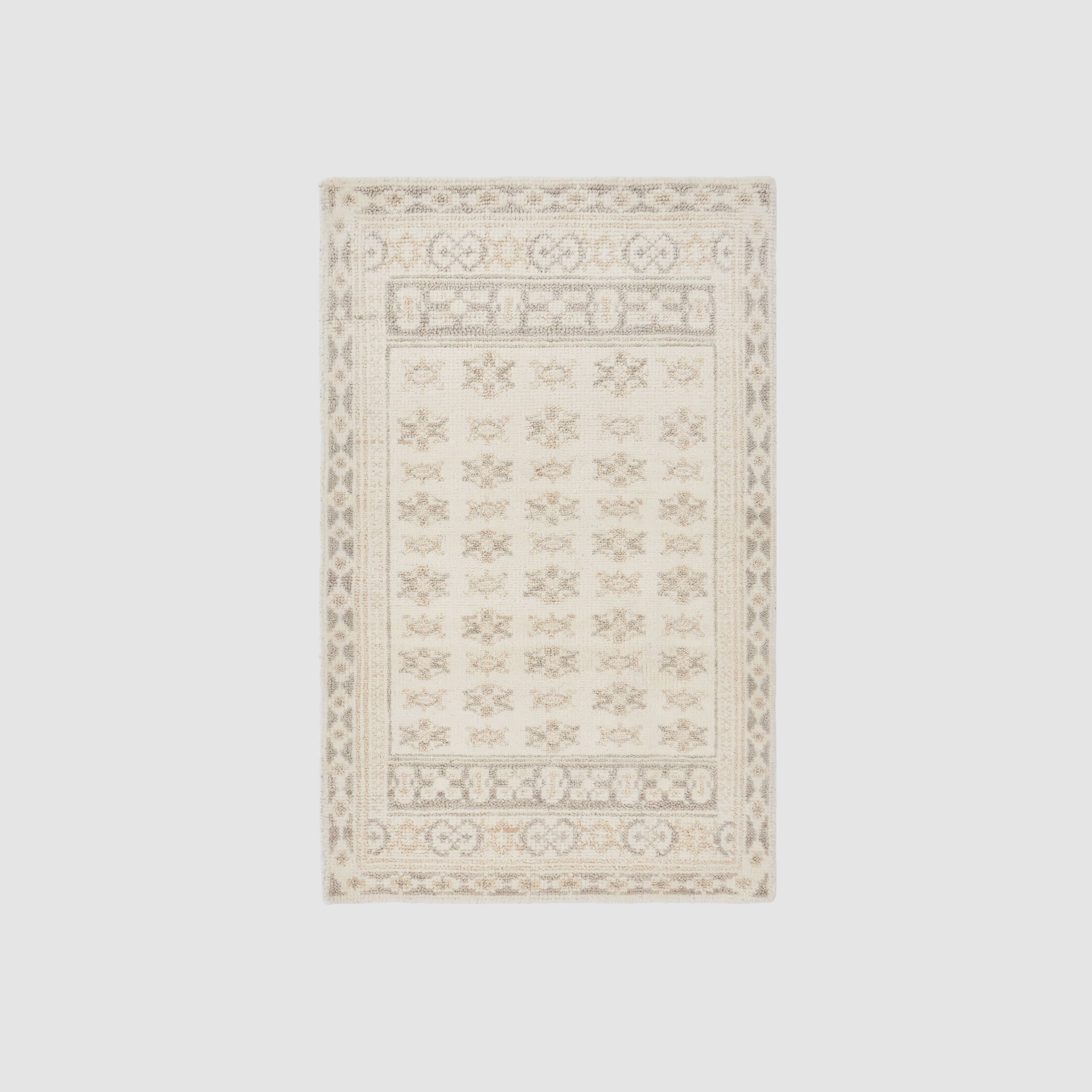 Handwoven Rug with Subtle Raised Pattern | Light Neutral Tone